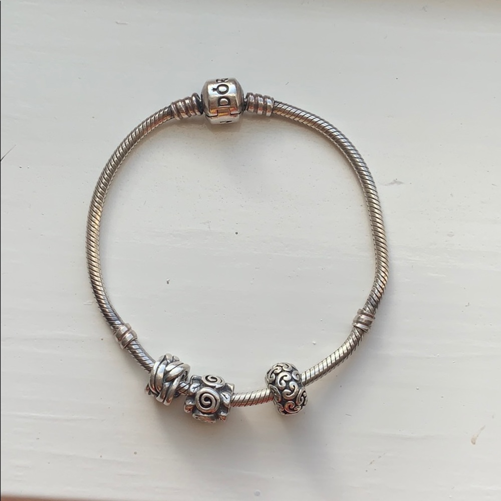 Pandora bracelet with three charms